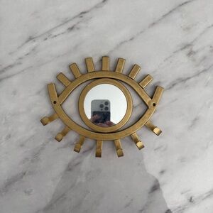 Gold Eye-Shaped Wall Mirror